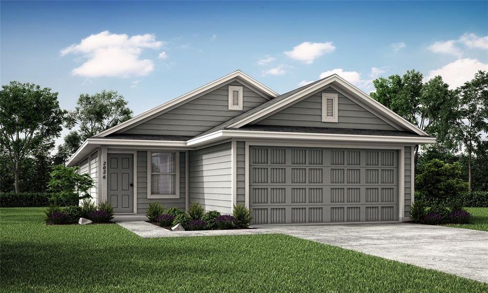 View of front facade with a garage and a front lawn