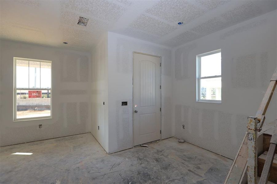 In-progress construction of a new home in Lake Star at Ovation, Winter Garden, FL (Image 10).