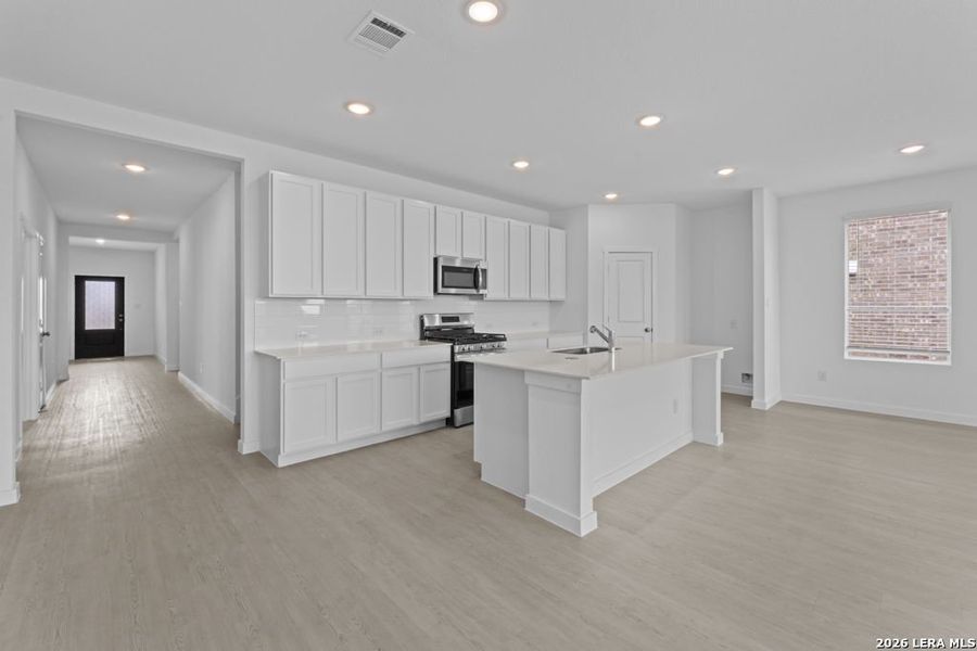 Furnished interior view inside a new home in Brookmill, San Antonio (Image 8).