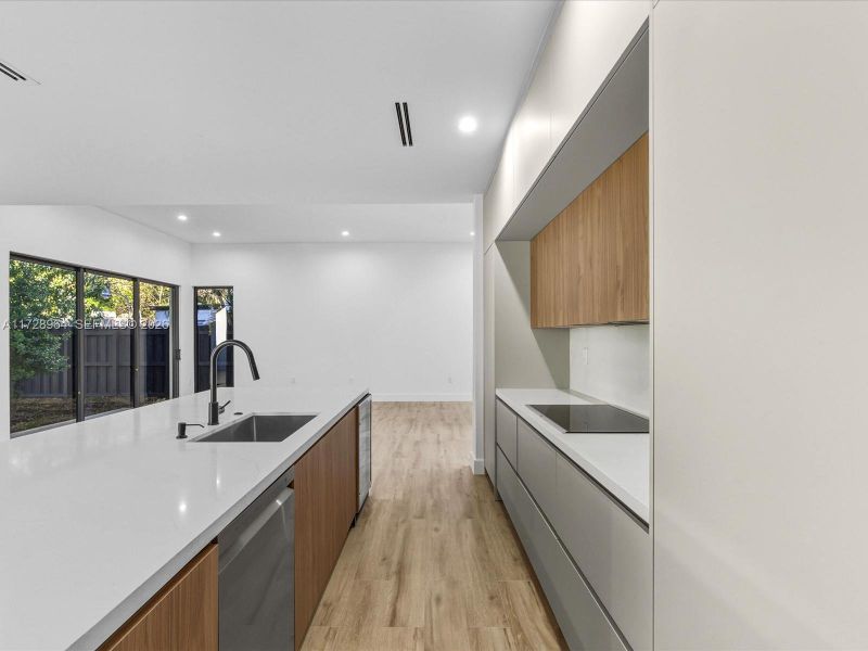 Furnished interior view inside a new home in , Miami (Image 16). Furnished interior view inside a new home in , Miami (Image 16).