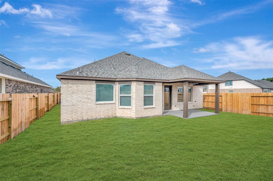 Exterior details and patio area of a home in Sorella, Tomball (Image 20).