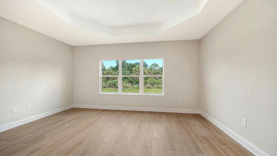 Spacious, unfurnished interior of a new home in Grand Park Real Estate and Homes for Sale in Sarasota, FL - Neal Communities, Sarasota (Image 40).