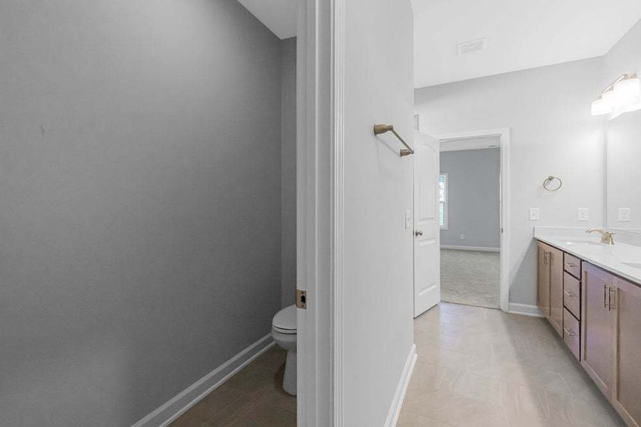 Representative unfurnished interior of a home built from the Weymouth by Caviness & Cates Communities in Bartlett Manor, Youngsville (Image 64).