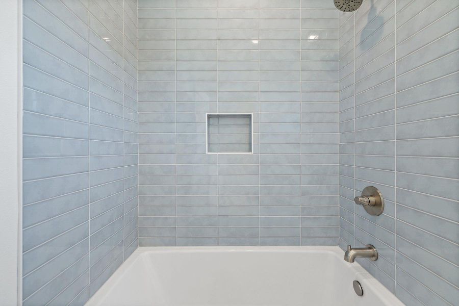 Full bath featuring bathtub / shower combination