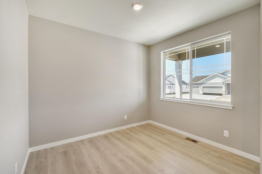 Representative unfurnished interior of a home built from the Holcombe by D.R. Horton in Brighton Crossing, Brighton (Image 20).