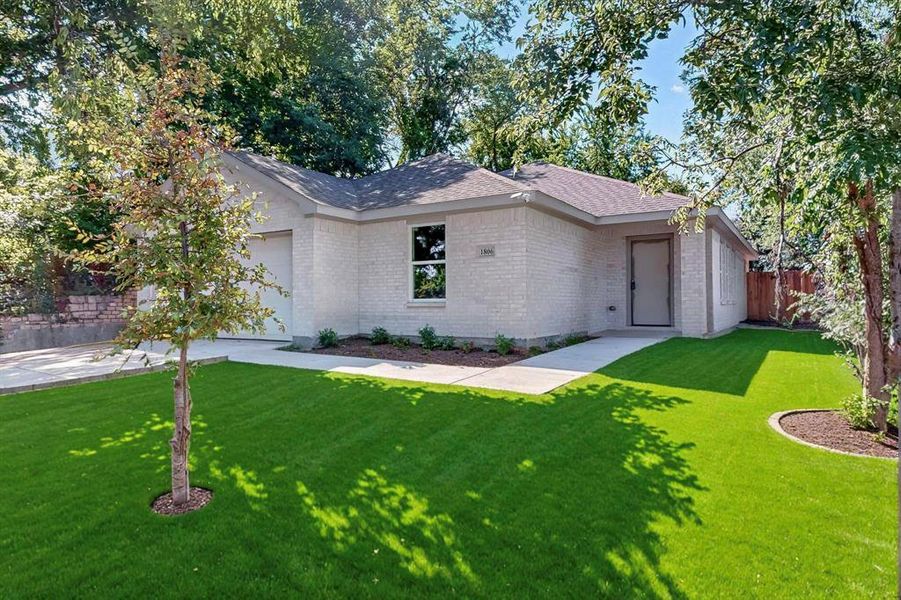 Front exterior of a new home in , Dallas, TX, highlighting curb appeal (Image 22).