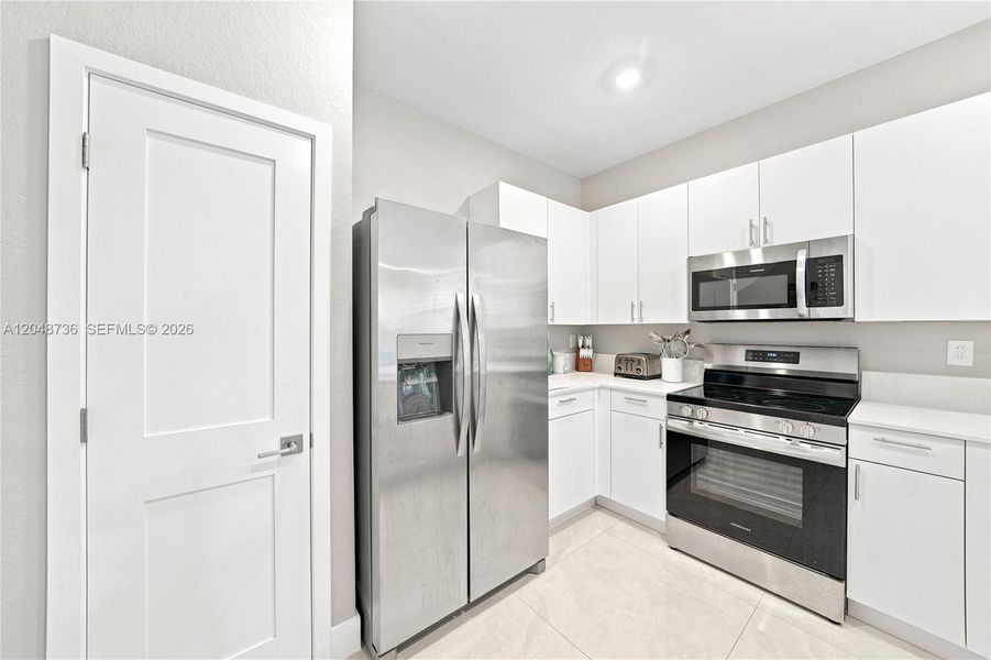 Furnished interior view inside a new home in , Miami (Image 13). Furnished interior view inside a new home in , Miami (Image 13).
