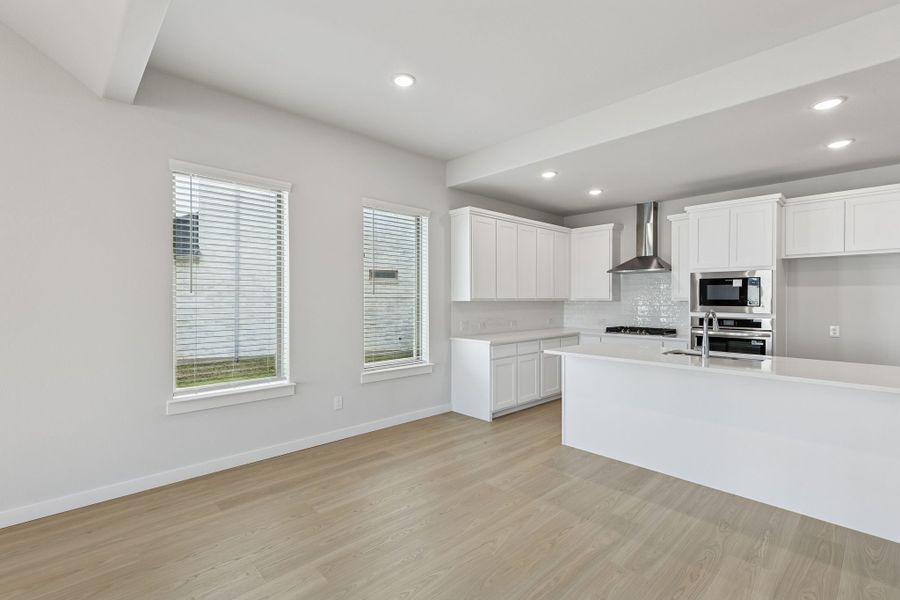 Kitchen in the Stanley II home plan by Trophy Signature Homes – REPRESENTATIVE PHOTO Kitchen in the Stanley II home plan by Trophy Signature Homes – REPRESENTATIVE PHOTO