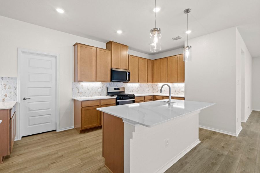Furnished interior view inside a new home in Salerno - Classic Collection, Round Rock (Image 8). Furnished interior view inside a new home in Salerno - Classic Collection, Round Rock (Image 8).