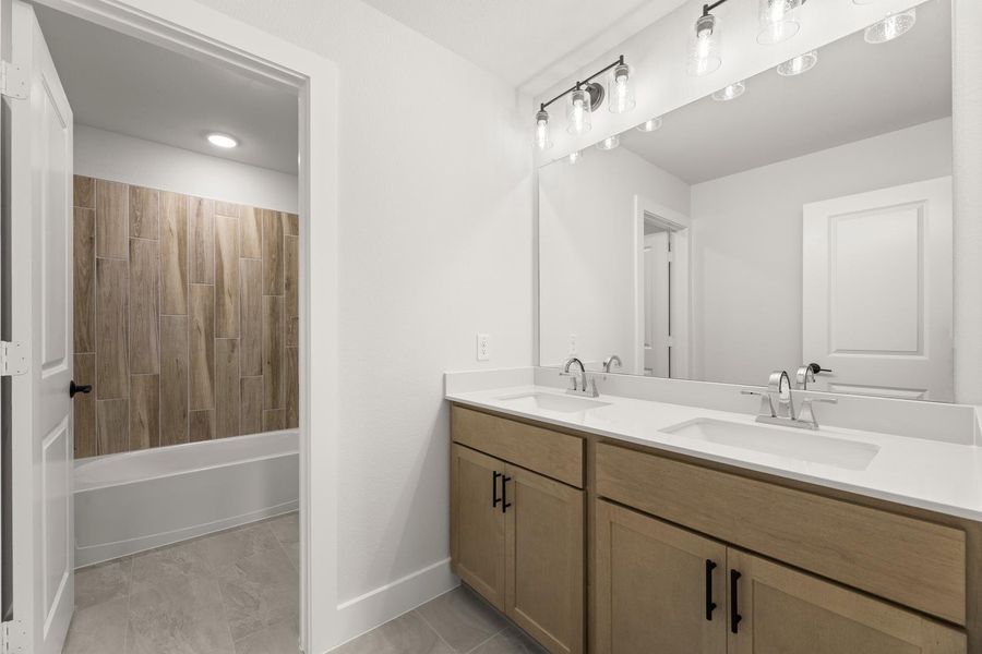 Furnished interior view inside a new home in Discovery Collection at Union Park, Little Elm (Image 11). Furnished interior view inside a new home in Discovery Collection at Union Park, Little Elm (Image 11).