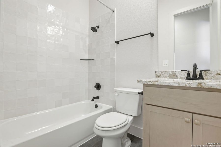 Furnished interior view inside a new home in Ventana - 60', Bulverde (Image 14).