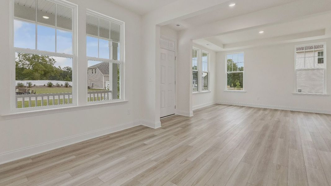 Stonehaven home plan front entry with adjacent formal dining room and flex space