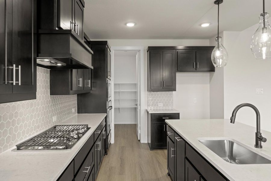 Representative furnished interior of a home built from the Davis by Tri Pointe Homes in Somerset Park, Rockwall (Image 5).