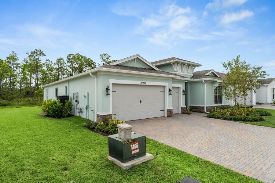 Front exterior of a new home in , Port St. Lucie, FL, highlighting curb appeal (Image 25). Front exterior of a new home in , Port St. Lucie, FL, highlighting curb appeal (Image 25).