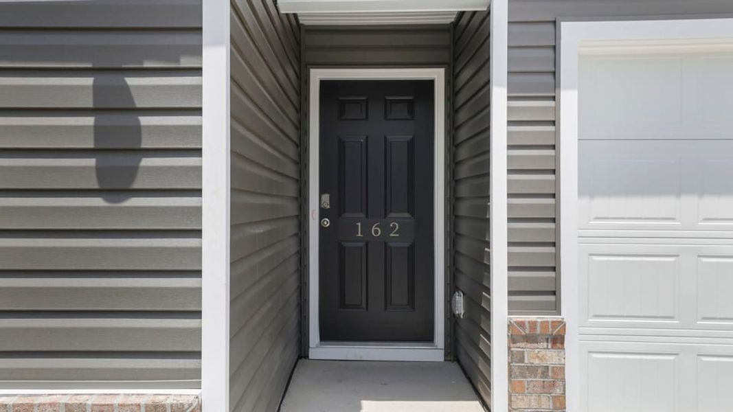 Exterior details and patio area of a home in Cedar Gap, Fountain Inn (Image 3).