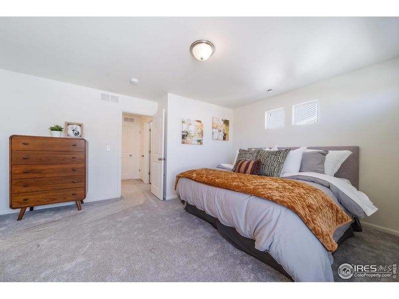 Furnished interior view inside a new home in Thompson River Ranch, Johnstown (Image 9).