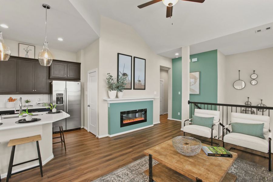 Representative furnished interior of a home built from the Summerhouse 2 by Chesmar Homes in Meridiana Townhomes, Iowa Colony (Image 5).