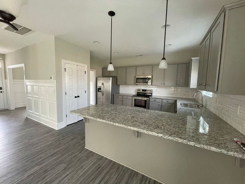 Representative furnished interior of a home built from the New Haven by Bill Clark Homes in Carolina Creek, Hampstead (Image 5).