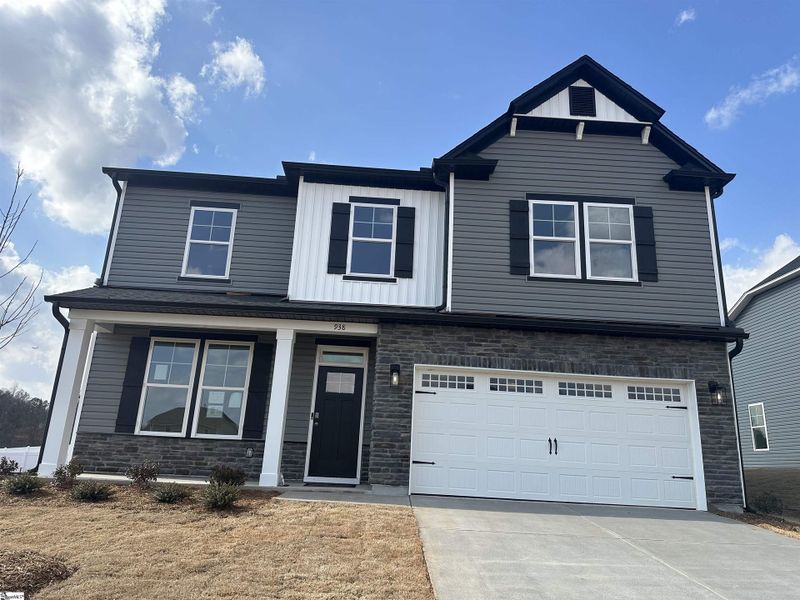Front exterior of a new home in Shiloh Trail, Wellford, SC, highlighting curb appeal (Image 2).
