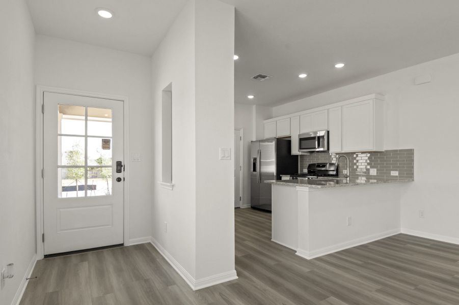 Furnished interior view inside a new home in Crosswinds, Kyle (Image 6).