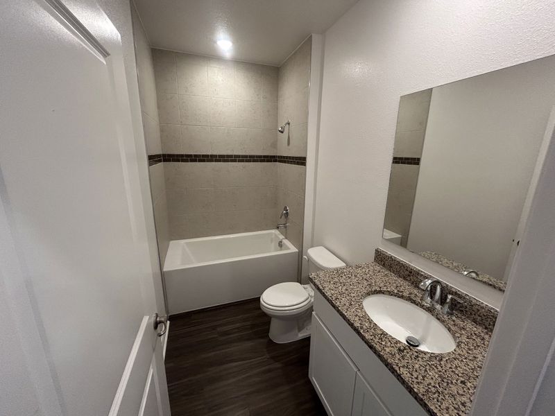 Furnished interior view inside a new home in Brookshire Green, Kingsland (Image 1).