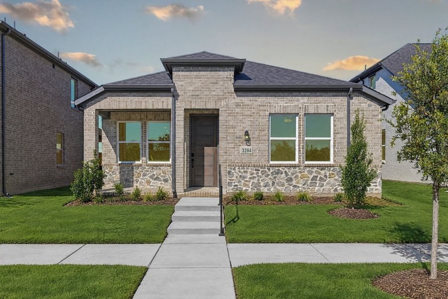 Front exterior of a new home in North Sky Celina, Celina, TX, highlighting curb appeal (Image 2). Front exterior of a new home in North Sky Celina, Celina, TX, highlighting curb appeal (Image 2).