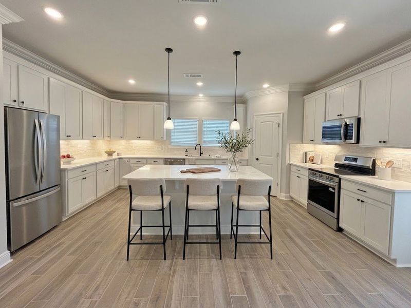 Furnished interior view inside a new home in Natureview, Freeport (Image 5).