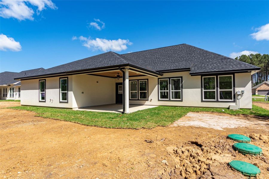 Front exterior of a new home in , Dayton, TX, highlighting curb appeal (Image 25).
