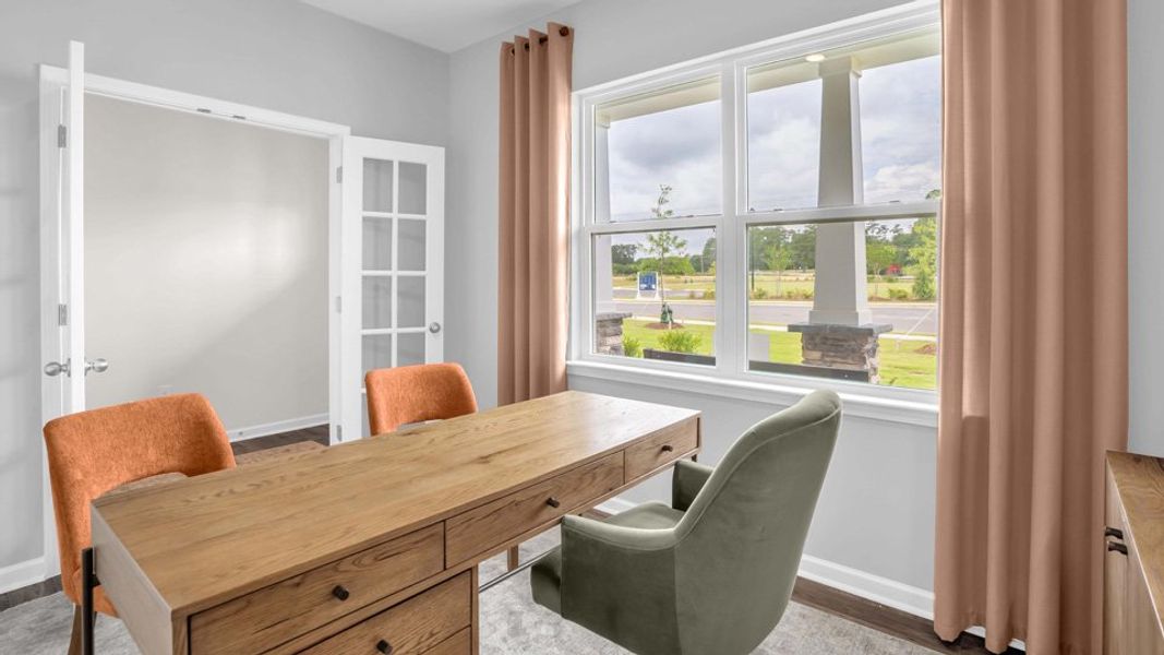 Representative furnished interior of a home built from the WILMINGTON by D.R. Horton in Shahbain Reserve, Raeford (Image 4).