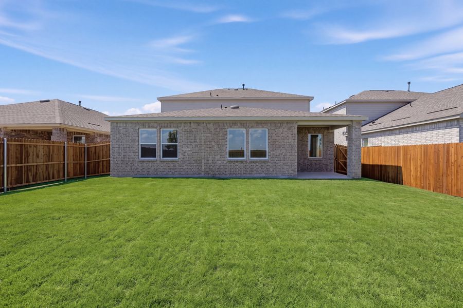 Exterior details and patio area of a home in Parks at Foster Crossing, Anna (Image 4).
