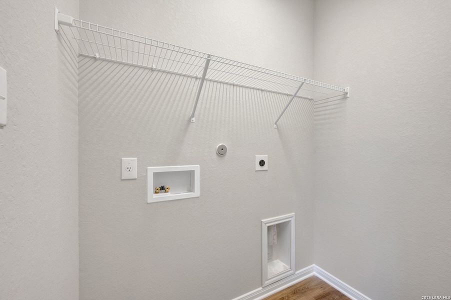 Spacious, unfurnished interior of a new home in Hunters Ranch, San Antonio (Image 30).