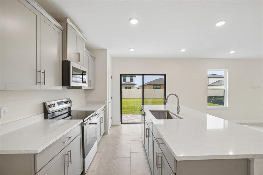 Furnished interior view inside a new home in Grasslands West, Lakeland (Image 5).