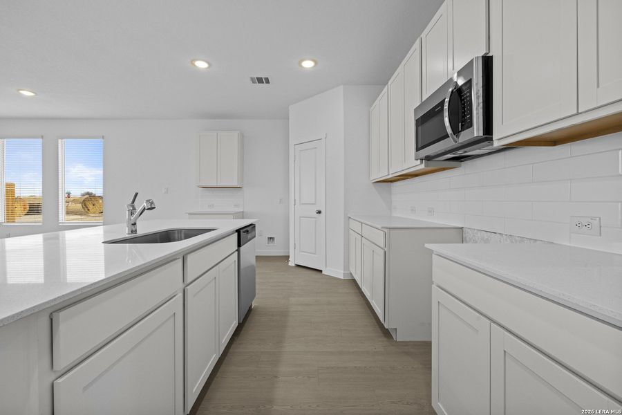 Furnished interior view inside a new home in Voss Farms, New Braunfels (Image 9).