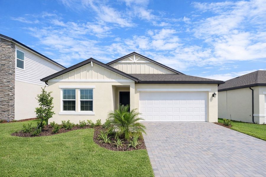 Front exterior of a new home in Angeline, Land O' Lakes, FL, highlighting curb appeal (Image 1). Front exterior of a new home in Angeline, Land O' Lakes, FL, highlighting curb appeal (Image 1).