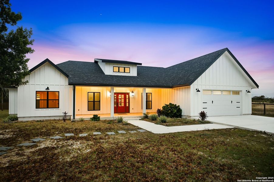 Front exterior of a new home in , Bandera, TX, highlighting curb appeal (Image 1). Front exterior of a new home in , Bandera, TX, highlighting curb appeal (Image 1).