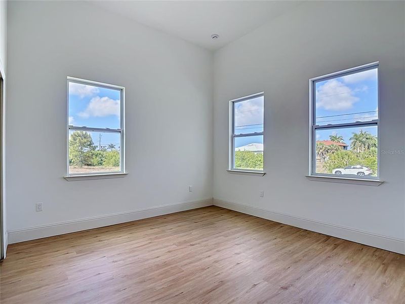 Spacious, unfurnished interior of a new home in , Port Charlotte (Image 28).