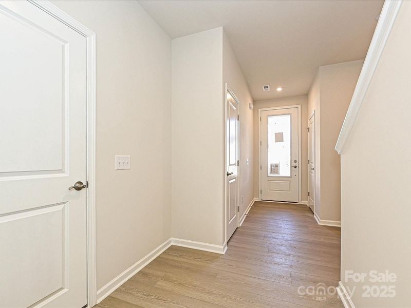 Front Entry Through 8' Grand Doorway. Front Entry Through 8' Grand Doorway.