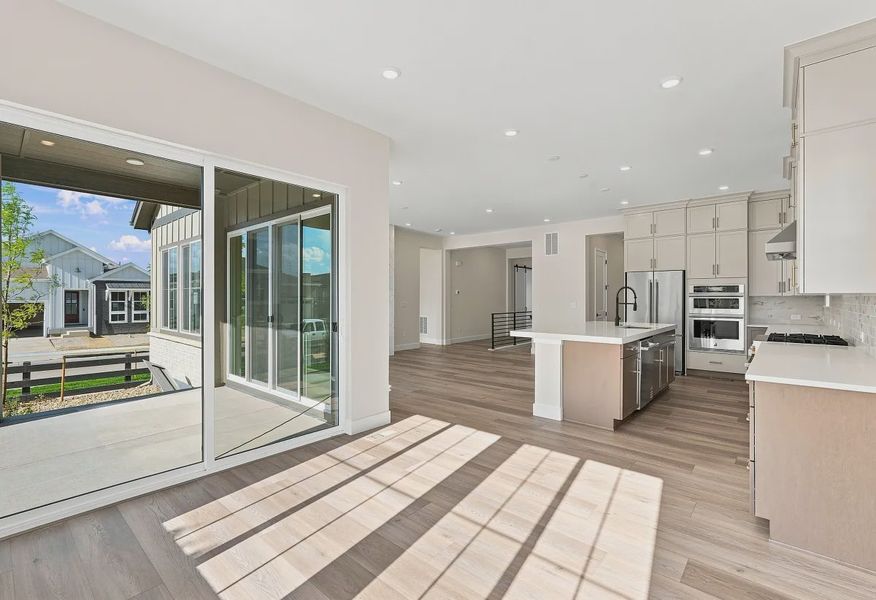 Homesite 50 Dining, Patio, Kitchen + Great Room - 11 of 19 Homesite 50 Dining, Patio, Kitchen + Great Room - 11 of 19