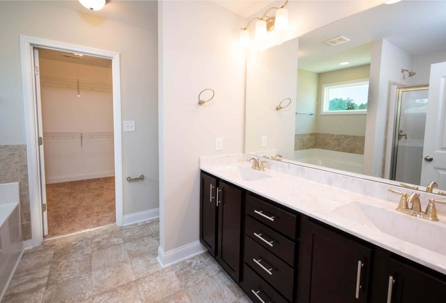 Representative furnished interior of a home built from the Drayton by Caviness & Cates Communities in Bartlett Manor, Youngsville (Image 217).
