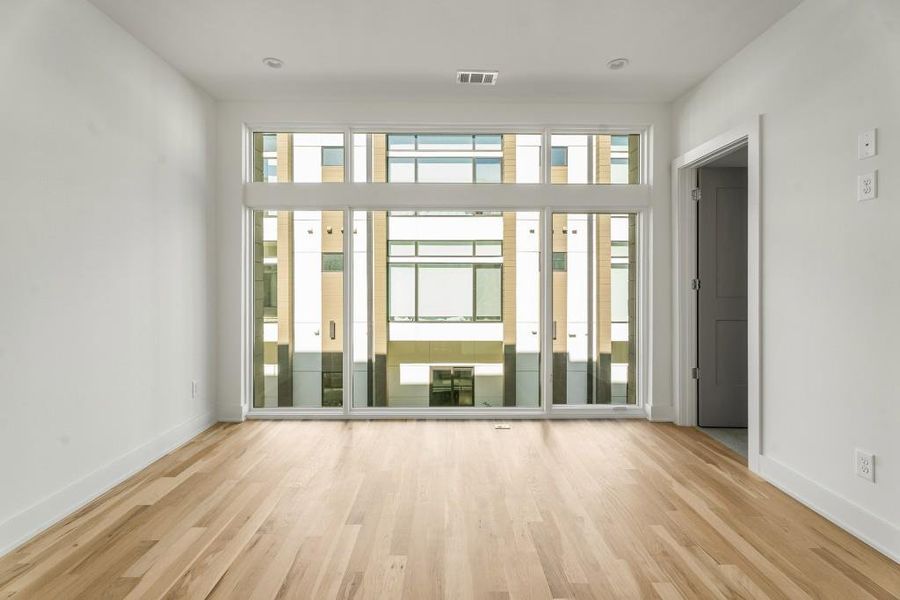 Spacious, unfurnished interior of a new home in Freedom Townhomes, Atlanta (Image 23).
