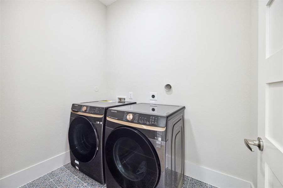 Laundry room is conveniently located on the third floor near the primary suite. Full size washer and dryer and included! (Cabinets to be installed)