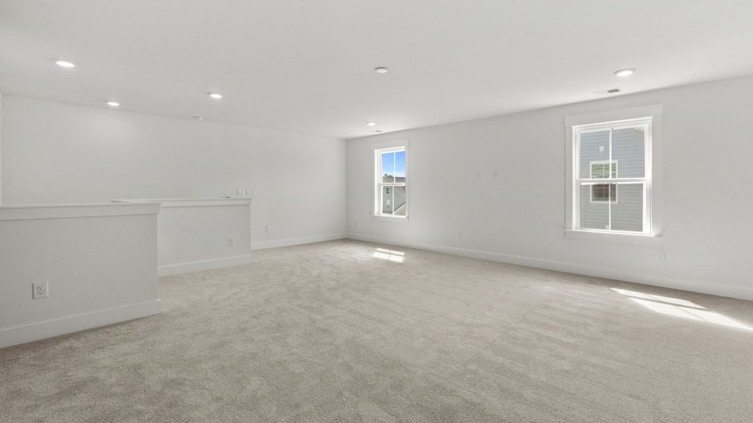 Enjoy a versatile upstairs bonus room, ideal for family time or hobbies.