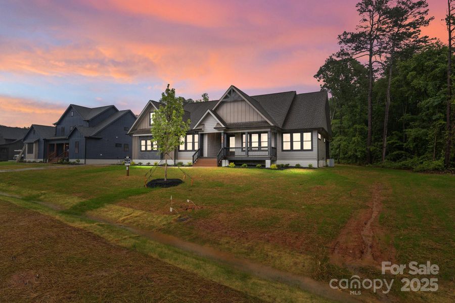 Front exterior of a new home in , Statesville, NC, highlighting curb appeal (Image 18).