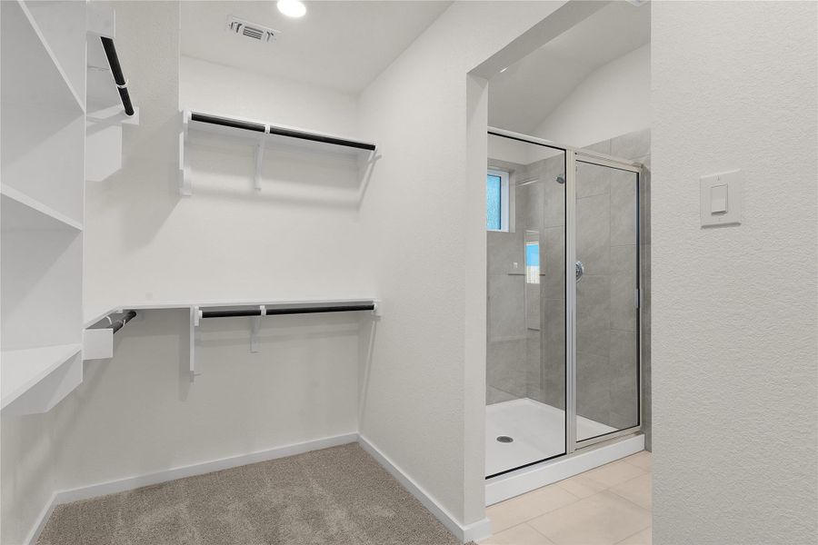 Bathroom featuring  shower combination and baseboards