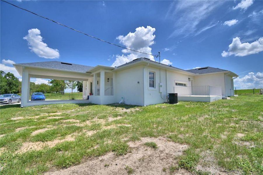 Exterior details and patio area of a home in , Polk City (Image 20).