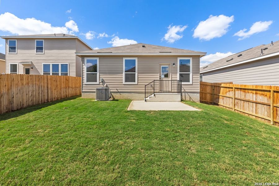 Exterior details and patio area of a home in Knox Ridge, Converse (Image 21).