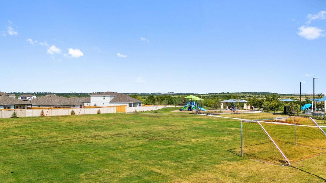 Exterior details and patio area of a home in Prairie Lakes, Buda (Image 3).