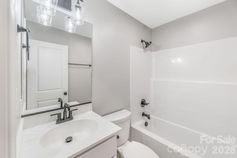 Furnished interior view inside a new home in , Waynesville (Image 9).