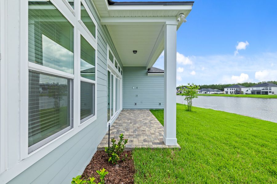 Representative exterior photo of a completed home built from the Aurora by Riverside Homes in Hidden Creek at SilverLeaf, St. Augustine, FL (Image 30).