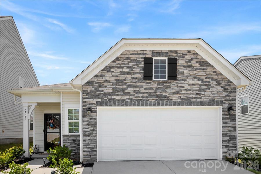 Front exterior of a new home in Legacy Ridge, Catawba, NC, highlighting curb appeal (Image 21). Front exterior of a new home in Legacy Ridge, Catawba, NC, highlighting curb appeal (Image 21).